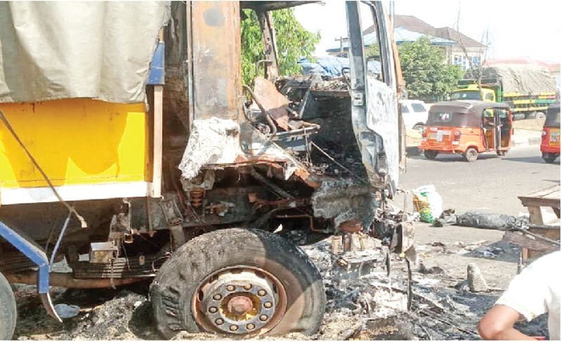 Truck driver kills tricycle rider, hoodlums loot rice